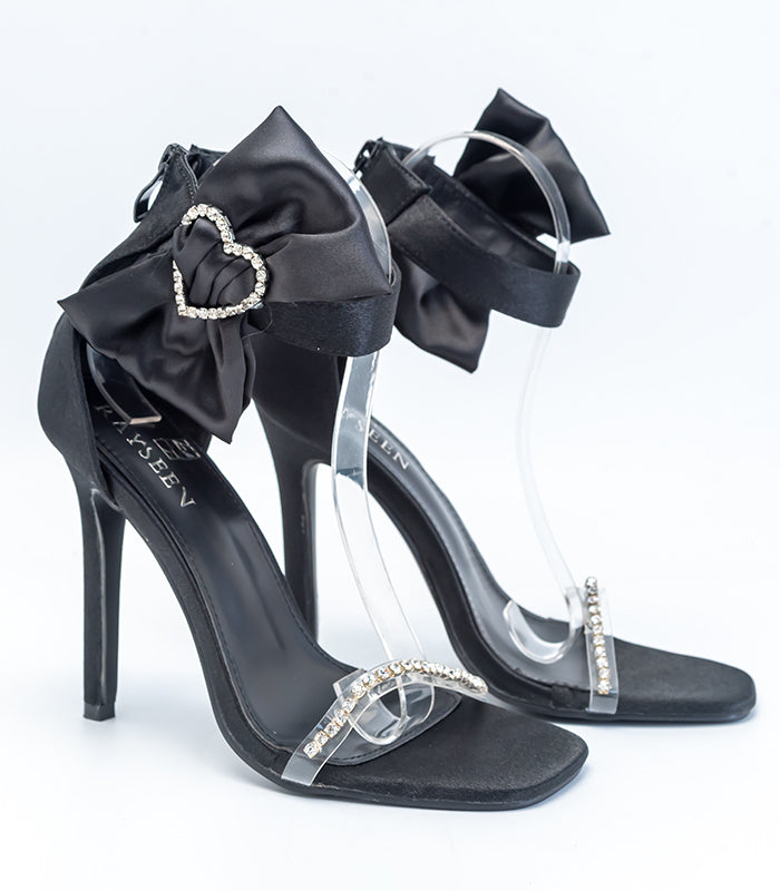 Fashionable Date night - Black stiletto heels with elegant details, perfect for a glamorous date night